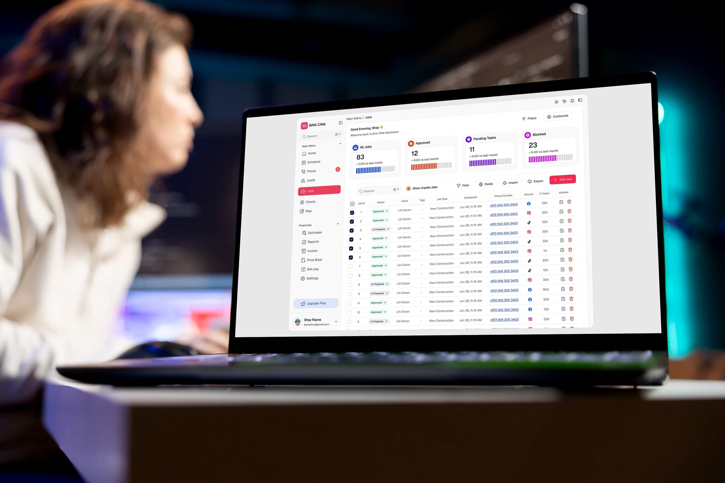 Custom CRM dashboard shown on a laptop